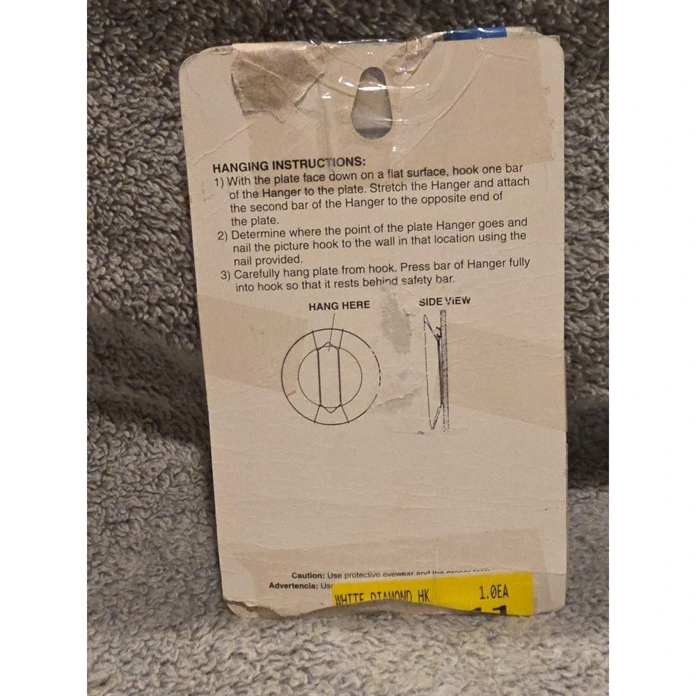 One New Symmetry Brand Brass Plated Plate Hanger holds 5